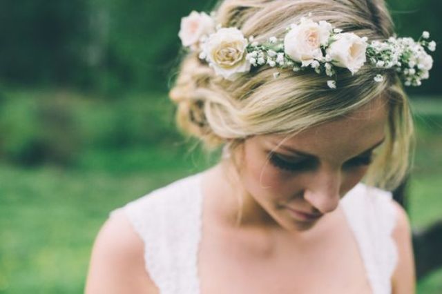 a subtle and delicate small flower crown with baby's breath and neutral roses is a lovely and delicate solution for a spring bride