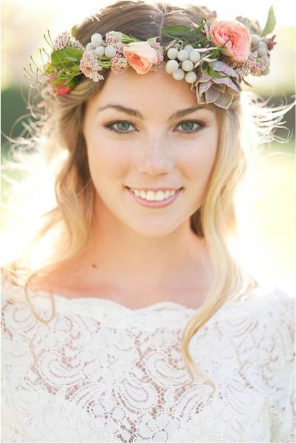 a spring flower crown with blush and pink blooms, berries, greenery and a succulent is a creative and textural piece to rock