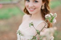 a fabulous spring flower crown with pink ranunculus and cherry blossom is a gorgeous idea for a spring or summer wedding