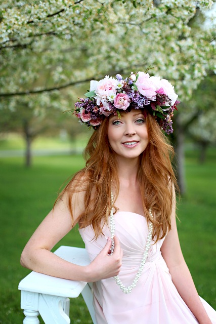 a super lush and bright floral crown with pink, lilac, purple blooms and some leaves is amazing for spring