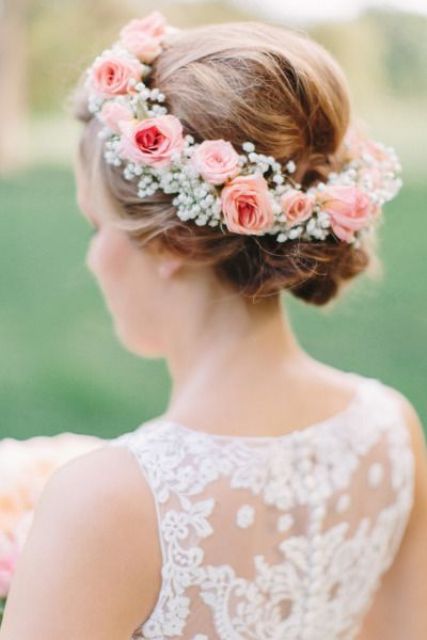 a traditional floral crown of baby's breath and pink roses is a lovely idea for a spring bride, bridesmaid or flower girl