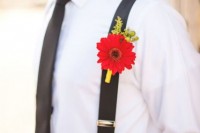 a bold red gerbera boutonniere with a bit of greenery is a lovely idea for a groom’s look, it will catch an eye