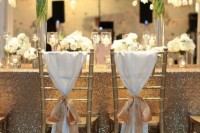 tall wedding centerpieces of clear vases and white tulips are amazing for chic and glam wedding tablescapes