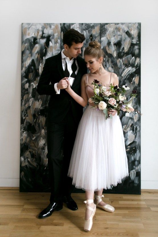 a ballet inspired bridal look with a pink spaghetti strap top, a white layered midi skirt, ballet flats with lacing up