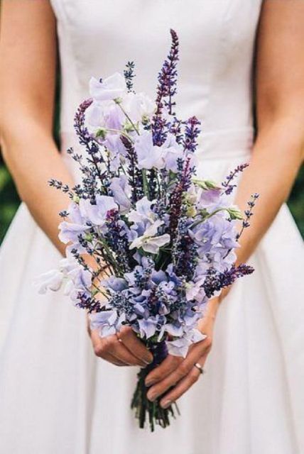 a beautiful lilac wedding bouquet of lavender and other blooms is a delicate and chic idea for a spring or summer wedding