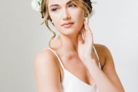 a beautiful white floral crown is an airy and delicate idea for a spring bride, especially with a neutral wedding dress