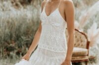a boho lace spaghetti strap A-line wedding dress will be a great choice for a spring or summer bride, you can rock it anytime