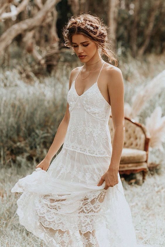 a boho lace spaghetti strap A-line wedding dress will be a great choice for a spring or summer bride, you can rock it anytime