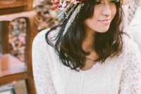 a cute oversized floral crown makes a cool addition to a bridal outfit