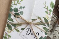a botanical wedding invitation with botanical prints and twine with a tag is a lovely idea for spring or summer