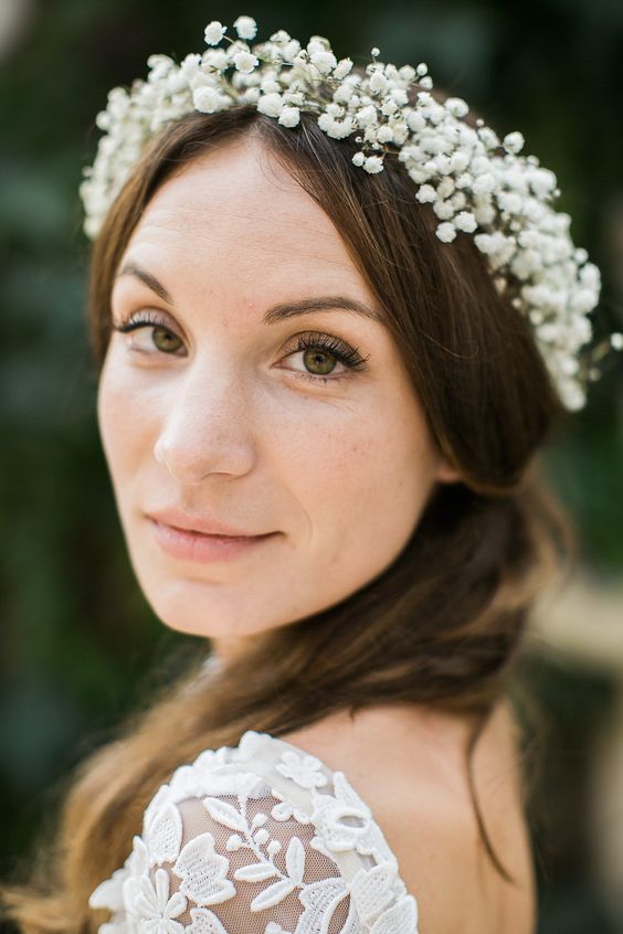 a classic white baby's breath floral crown is a timeless idea for any kind of wedding in any season and looks cool