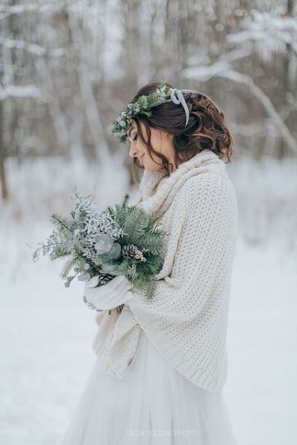 a creamy slouchy chunky knit sweater over your neutral wedding gown to feel warm