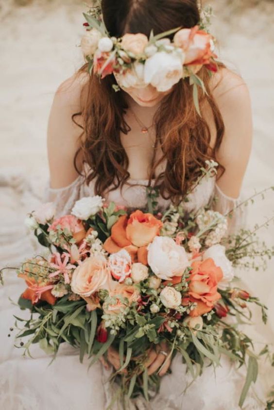 a delicate peachy and white flower crown and a matching wedding bouquet are a great solution for both a spring and a summer wedding