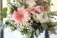 a fun textural wedding bouquet of white and blush garden roses, pink gerberas, baby’s breath and greenery