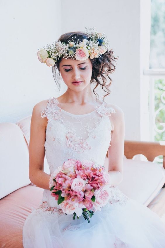 a lush floral crown with blush, peachy blooms, thistles and baby's breath is a very statement and cool idea