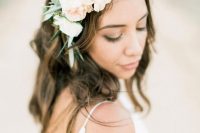 a pretty floral crown with greenery and blush blooms is amazing for spring and will be a nice solution for a pastel summer wedding