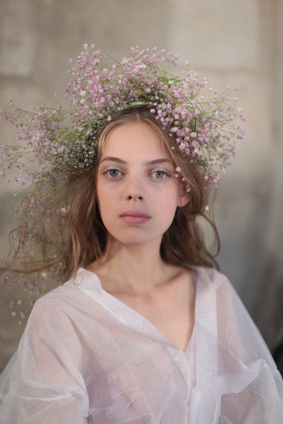 a simple and lovely white and pink baby's breath bridal crown is a pretty idea for a boho spring bride and not only