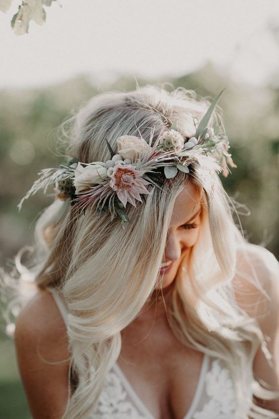 a subtle and delicate pastel spring flower crown with neutral and pastel blooms, greenery and berries is amazing