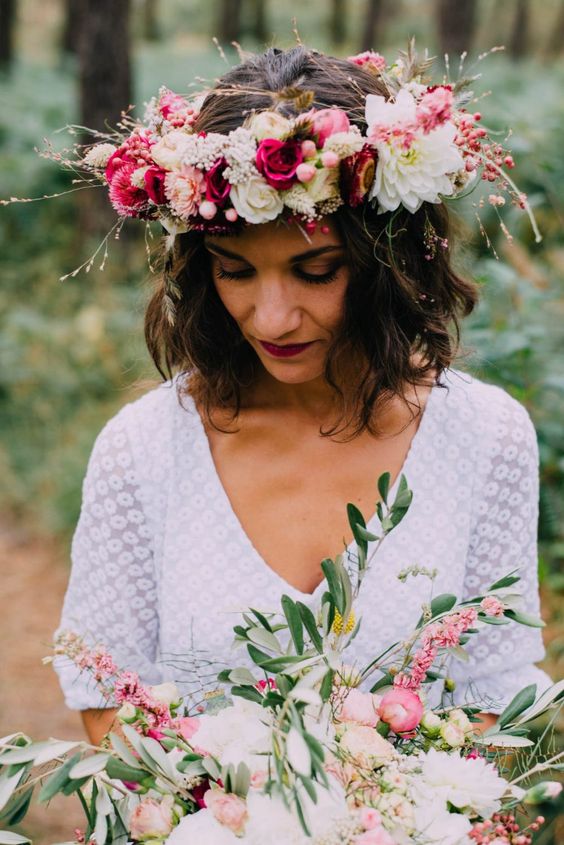 a super lush and bold floral crown with white, bold pink and fuchsia blooms and some twigs is a gorgeous idea for a bold wedding