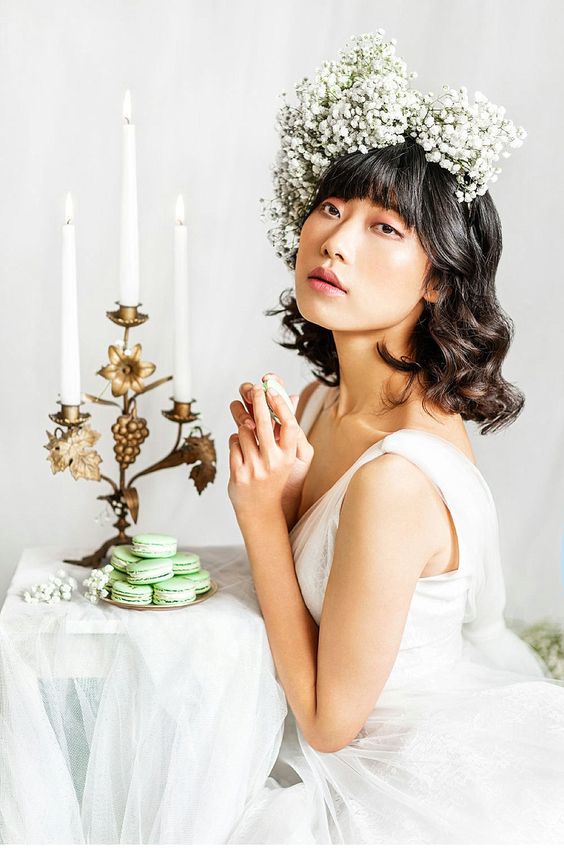 an oversized white baby's breath floral crown is a lovely idea for a spring bride, it's a timeless and traditional idea