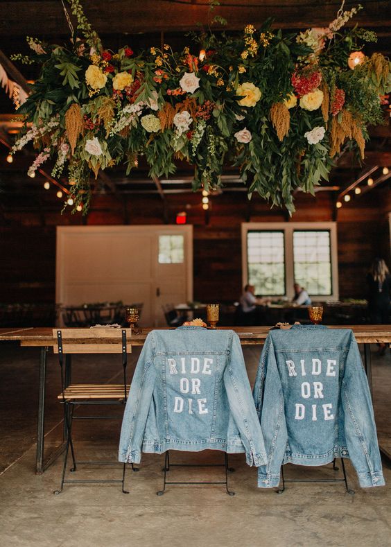 bleached blue denim jackets covering your wedding chairs will substitute usual signage and wreaths