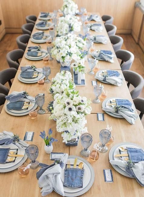 chambray napkins, cutlery pockets and matching denim cards and blue glasses for a chic and romantic wedding tablescape