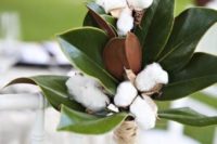 magnolia leaves and cotton will make your wedding aisle cozy and truly southern