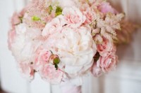 a pretty wedding bouquet of light pink blooms, white ones and just a bit of greenery is a gorgeous idea with a subtle feel