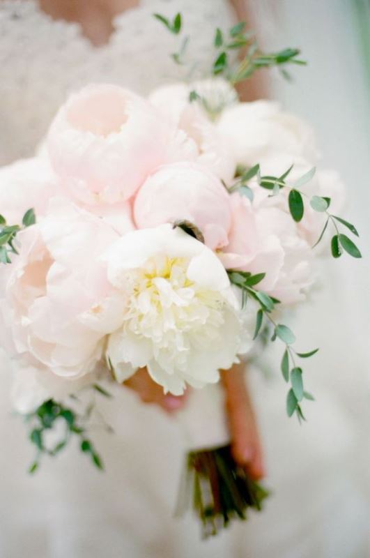 a lush light pink and white peony wedding bouquet with greenery touches is a chic and cool idea for a spring or summer wedding