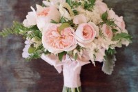 a cool blush peony rose and white anemone wedding bouquet with greenery is a lovely idea for a spring or summer wedding