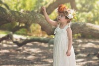 a boho lace maxi flower girl dress with thick straps and a ruffle bodice for a summer wedding