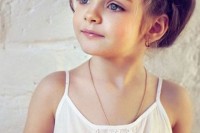 a complicated updo with a braided halo is a chic and beautiful idea for a flower girl with long hair