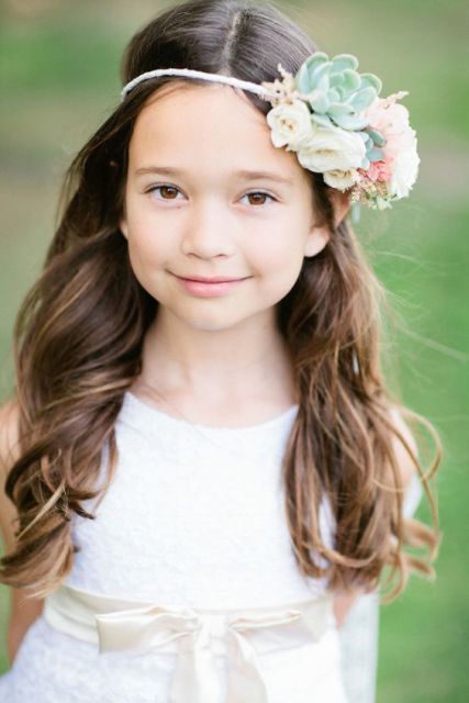 waves are always a great choice for a flower girl's hairstyle