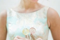 yellow and pink floral lollipops are amazing for spring and summer weddings, make them yourself adding dried blooms inside
