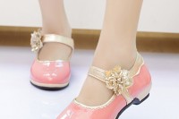 cute peachy pink shoes with gold straps and flowers will add color and a shiny touch to your look