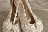 lace flat shoes with laces and fabric blooms will make the flower girl’s look cute and girlish
