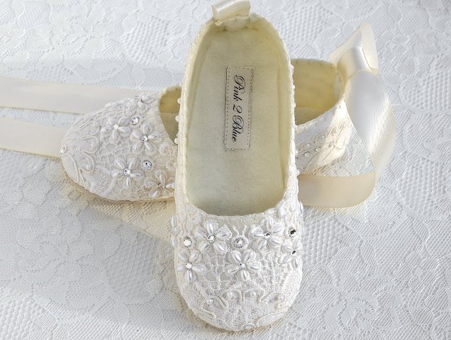 flat lace embellished shoes with silk straps are a cool addition for a girlish and cute look