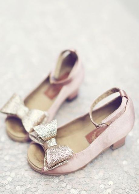 peep toe pink shoes with gold glitter bows and ankle straps look very glam and very pretty