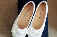 cute and neat white flats with bows on top are a chic and elegant idea for every flower girl, it’s classics