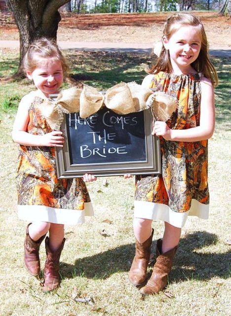 bright printed sleeveless knee dresses and cowboy boots for a bright rustic wedding