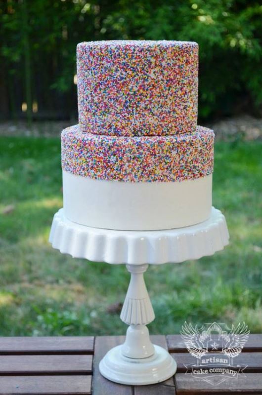 a creative wedding cake with color blocking - a white tier and a sprinkle one for a funny and whimsical wedding