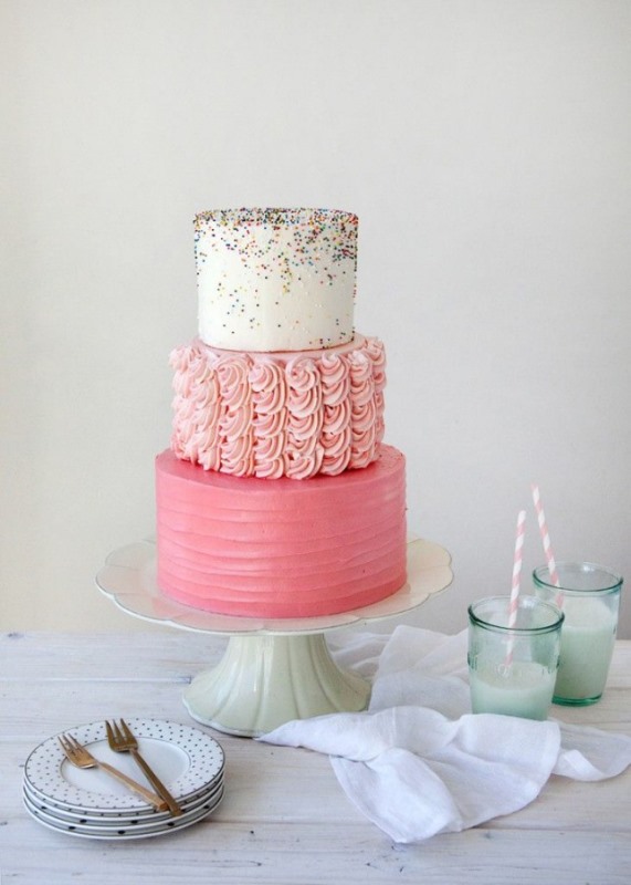 a bold wedding cake with a textural buttercream tier, a rose cream one and a white one with sprinkles is fun