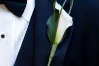 a white calla lily and greenery wedding boutonniere is a chic and lovely idea of a wedding accessory