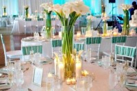 a white calla lily arrangement as a wedding centerpiece is a stylish idea for many elegant weddings, rock it anytime