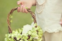 a lovely flower girl basket all covered with green hydrangeas is a great idea with a vintage touch