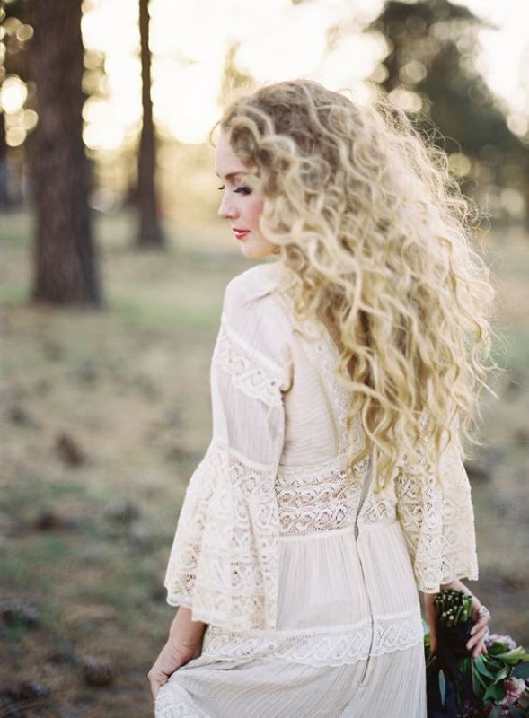 a bush or natural blonde curls is a very romantic hairstyle for every bride, be sure to rock your curls