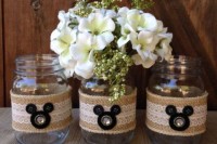 jars wrapped with burlap and lace plus large buttons that make up Mickey Mouse heads