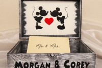 a wedding card box of weathered wood with Mickey and Minney Mouse and Disney-styled letters