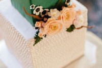 a whimsy square wedding cake in green and white tier with beads plus fresh and sugar flowers