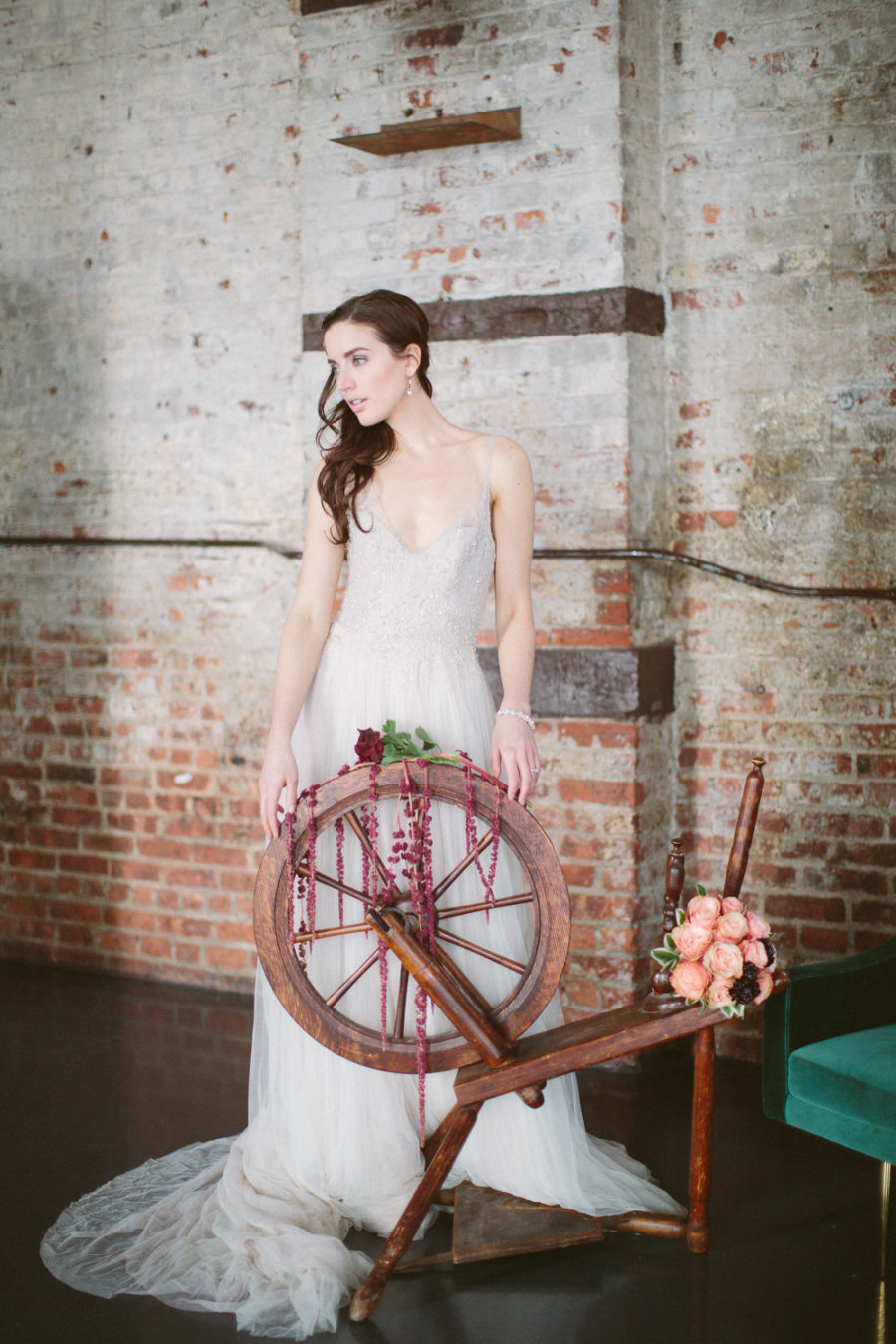 Sleeping Beauty themed bridal shot with a spinning wheel placed in the lounge